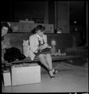 Woman and young boy in waiting room, Union Station, Chicago, May 1948
