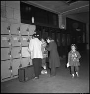 Women and girl at lockers, Union Station, Chicago, May 1948