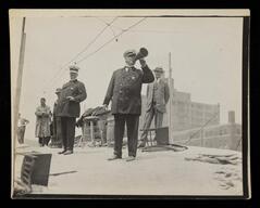 Assistant Police Chief Herman Schuettler issue orders the day after the Eastland disaster
