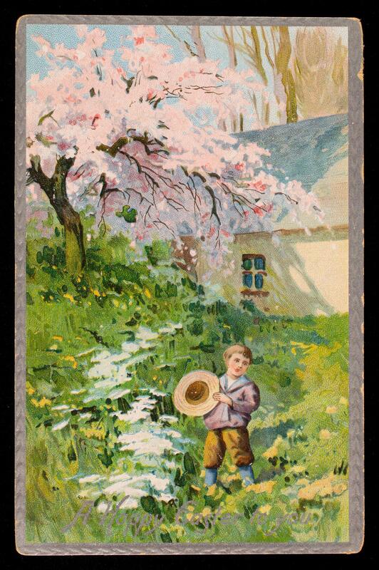 Boy holding hat