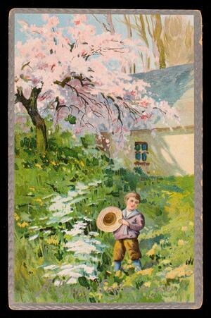 Boy holding hat