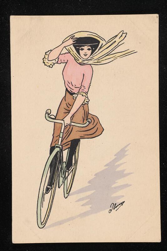 Woman in hat riding bicycle