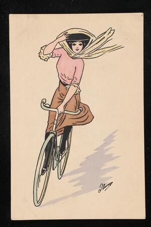 Woman in hat riding bicycle