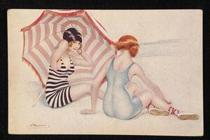 Two women sitting on the beach